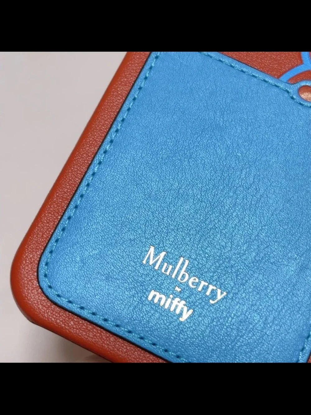 Mulberry Orange Leather Phone Case with Blue Pocket and Strap